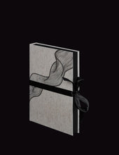 Load image into Gallery viewer, takkti limited notebook collection line art swirl design raw linen with a black print and black ribbon with black pages