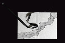 Load image into Gallery viewer, takkti limited notebook collection line art swirl design raw linen with a black print and black ribbon