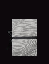 Load image into Gallery viewer, takkti limited notebook collection line art waves design raw linen with a black print and black ribbon