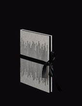 Load image into Gallery viewer, takkti limited notebook collection line art vertical lines design raw linen with a black print and black ribbon with black pages