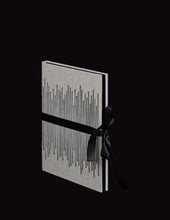 Load image into Gallery viewer, takkti limited notebook collection line art vertical lines design raw linen with a black print and black ribbon with black pages
